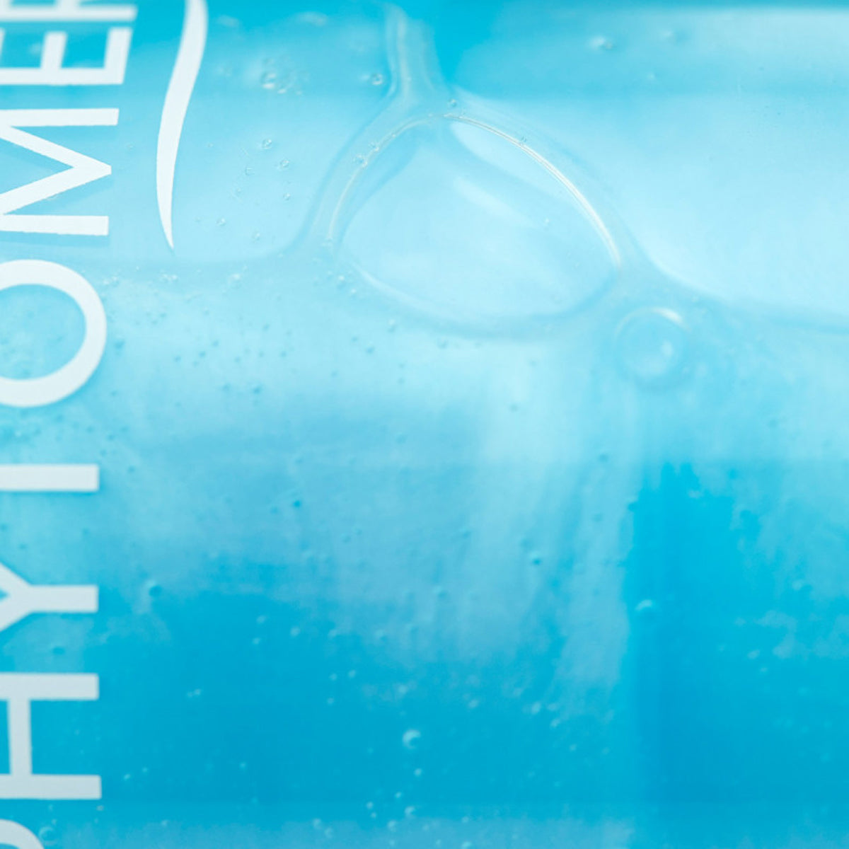 Oligomer Sensation Bath van Phytomer – licht schuimend badproduct. Uit de fles loopt mineraalrijke formule voor ontspanning en balans.