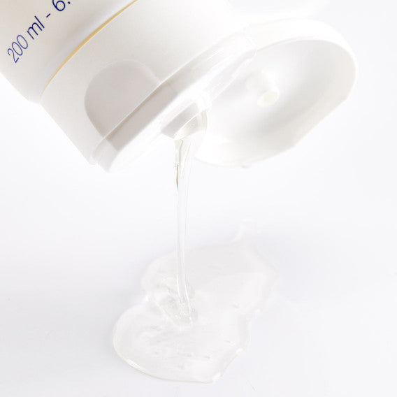 Phytomer Gentle Illuminating Shampoo – textuurfoto van vloeibare shampoo voor glans en vitaliteit