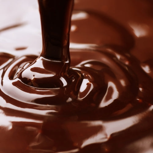 Chocolade Waxmelt – geurblokje van sojawas met warme cacao geur. Foto van gesmolten chocolade in rijke bruine tinten.