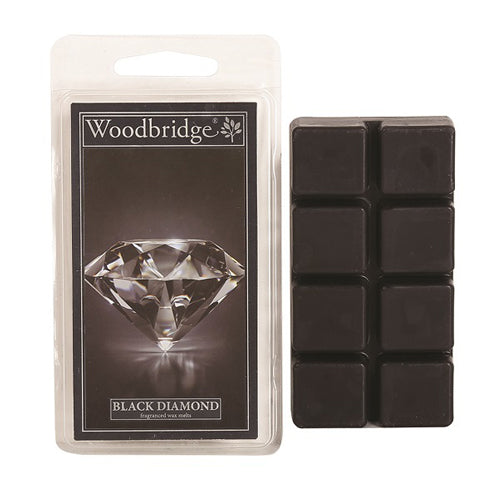 Black Diamond Wax Melts Woodbridge – luxe geurblokjes met citrus, bloemen en amber. Foto van zwarte wax melts met verpakking met diamantdesign.
