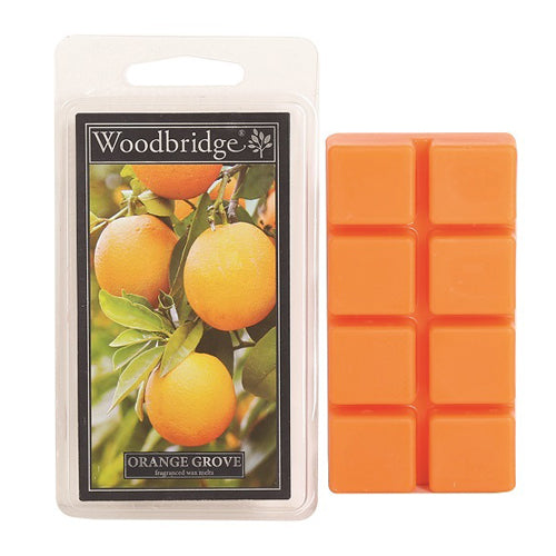 Orange Grove Wax Melts Woodbridge – fruitige geurblokjes met citrus, mango en musk. Foto van oranje wax melts met afbeelding van sinaasappels aan de boom.