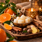 Golden Citrus waxmelt met sinaasappel, warme specerijen, gember en cederhout in luxe wellness sfeer